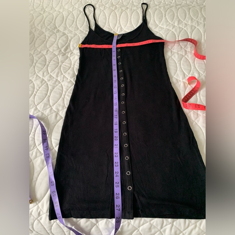 #25 Black ribbed dress with spaghetti straps and stud detail down the front.  Si - Picture 2 of 3